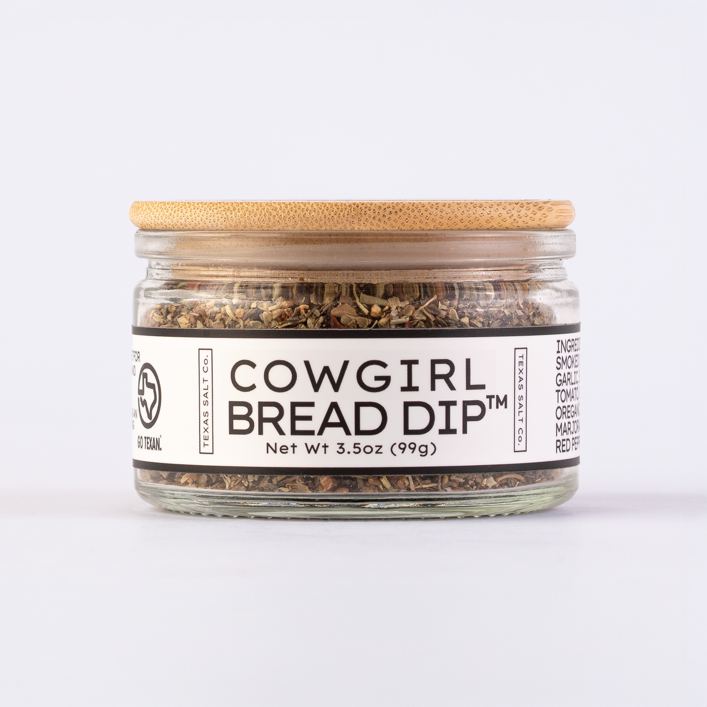 2oz jar of Cowgirl Bread Dip™ with bamboo lid, filled with herb and spice blend from Texas Salt Co.