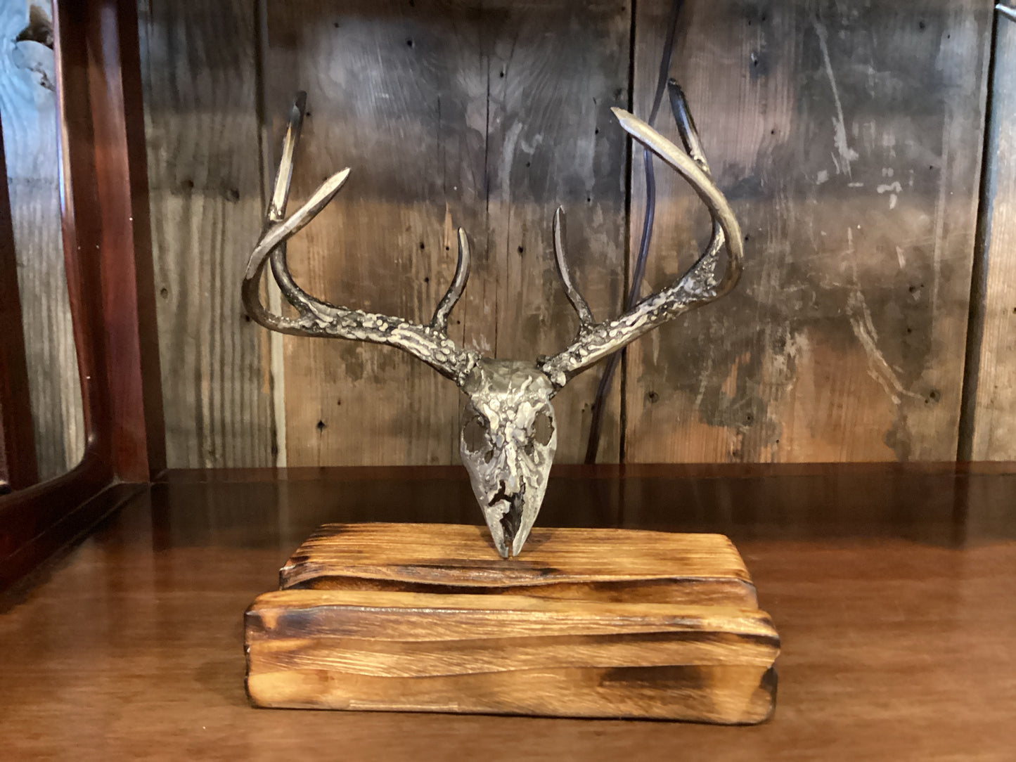 Tim's Stuff (Deer skull on light wood phone holder)