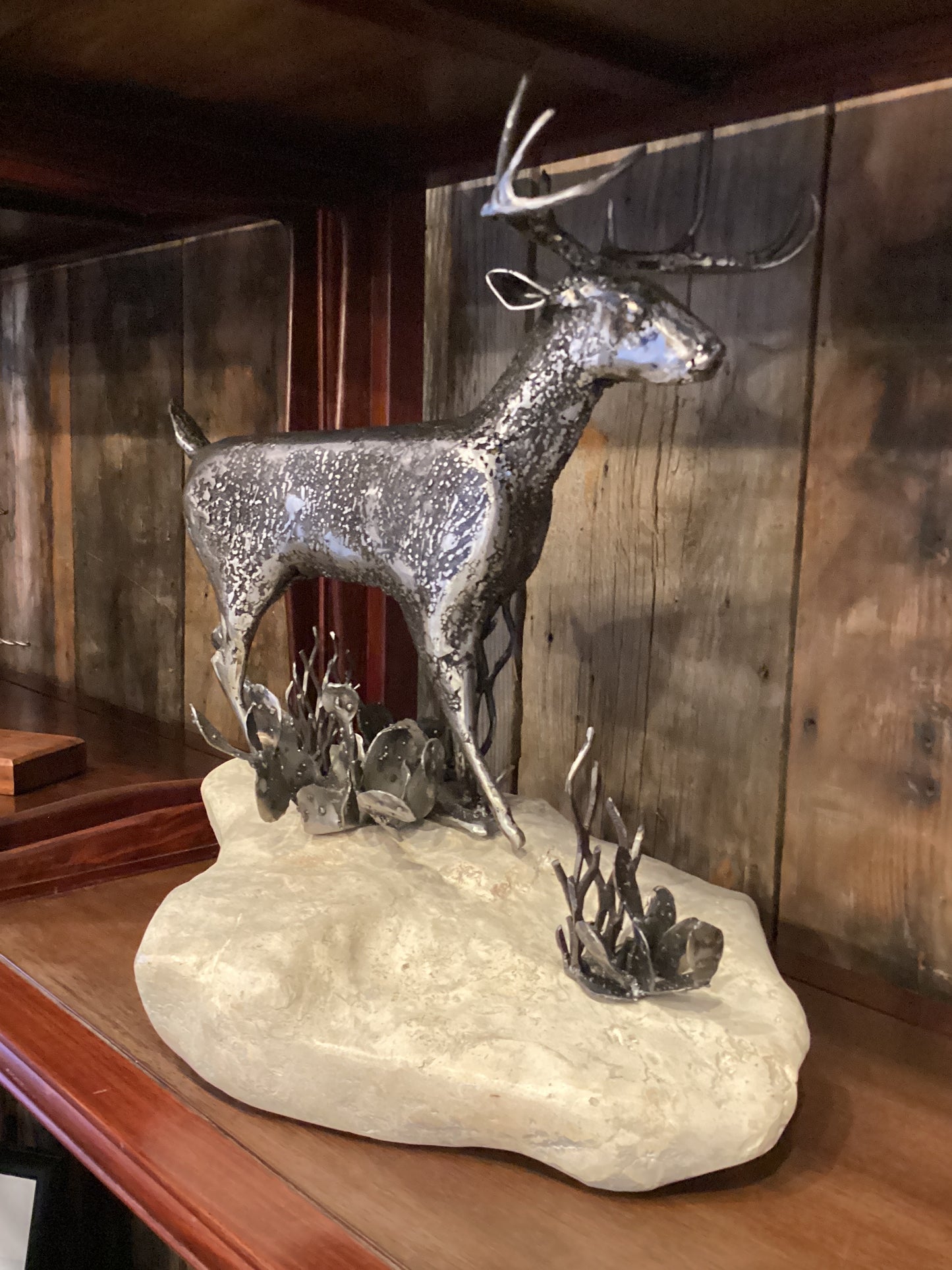 Tim's Stuff (Deer on limestone w/cactus & plants)